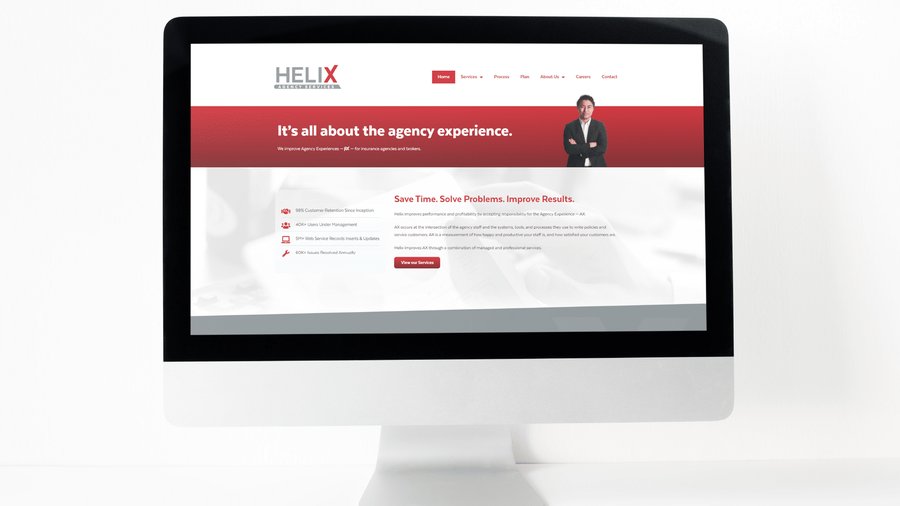 Helix Agency Services website shown on a desktop monitor